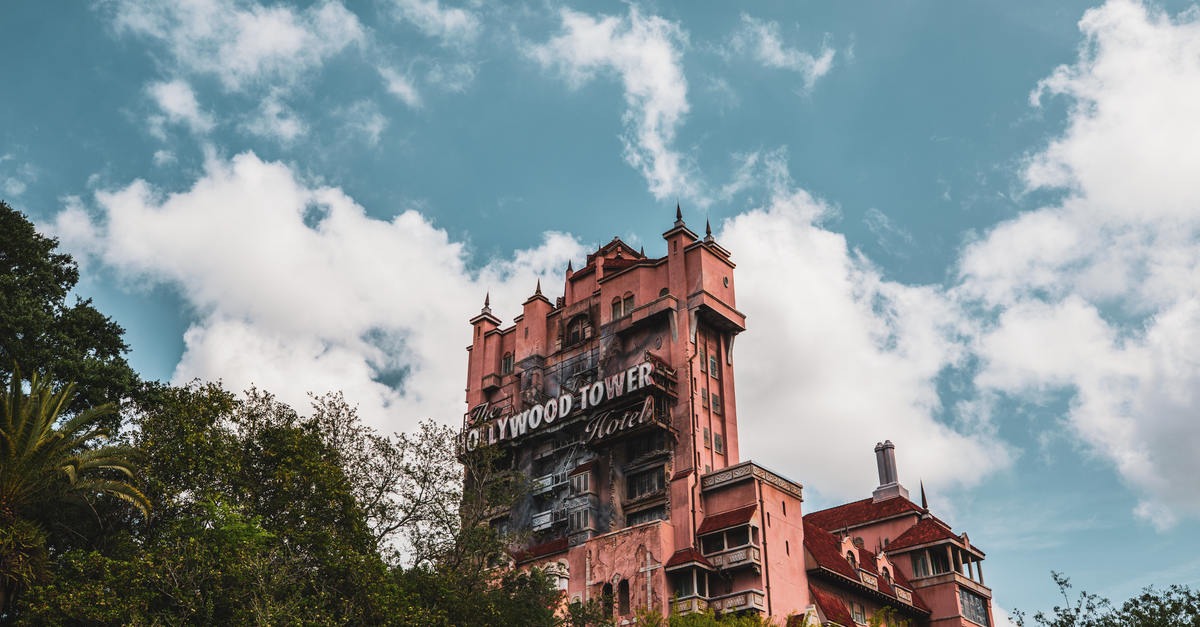 The iconic Hollywood Tower Hotel under a clear sky at Disney's Hollywood Studios in Florida.