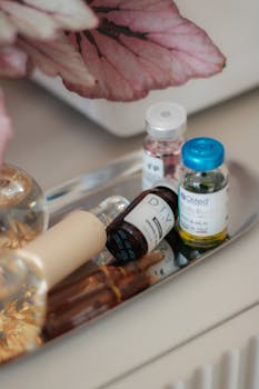 Aesthetic display of skincare products on a tray, perfect for beauty and wellness themes.