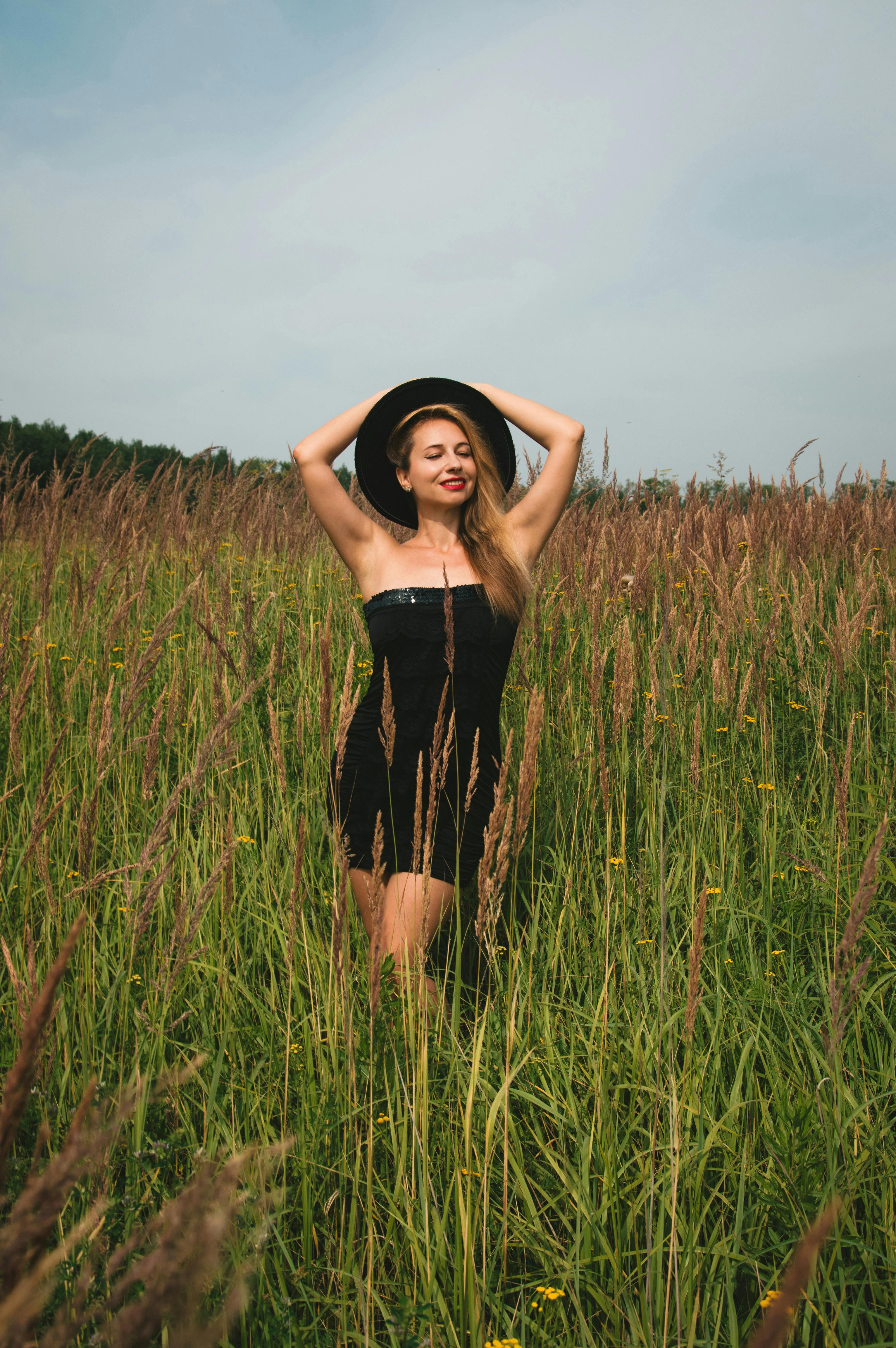 tall woman in a black dress Funnel Neck Sweater Dress in Soft Jersey main image 1