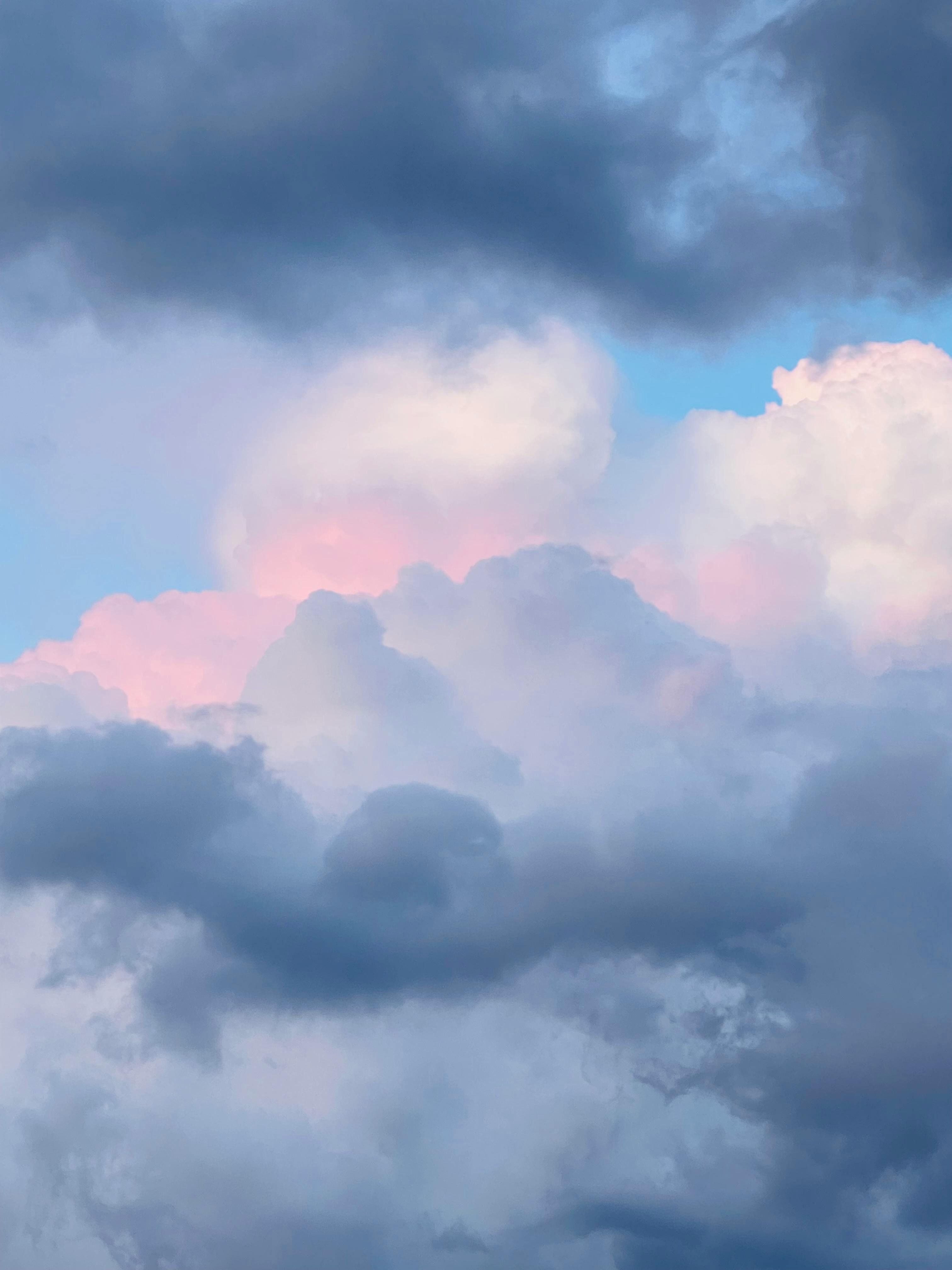 Beautiful Pastel Clouds Against Blue Sky · Free Stock Photo, image size:3024x4032