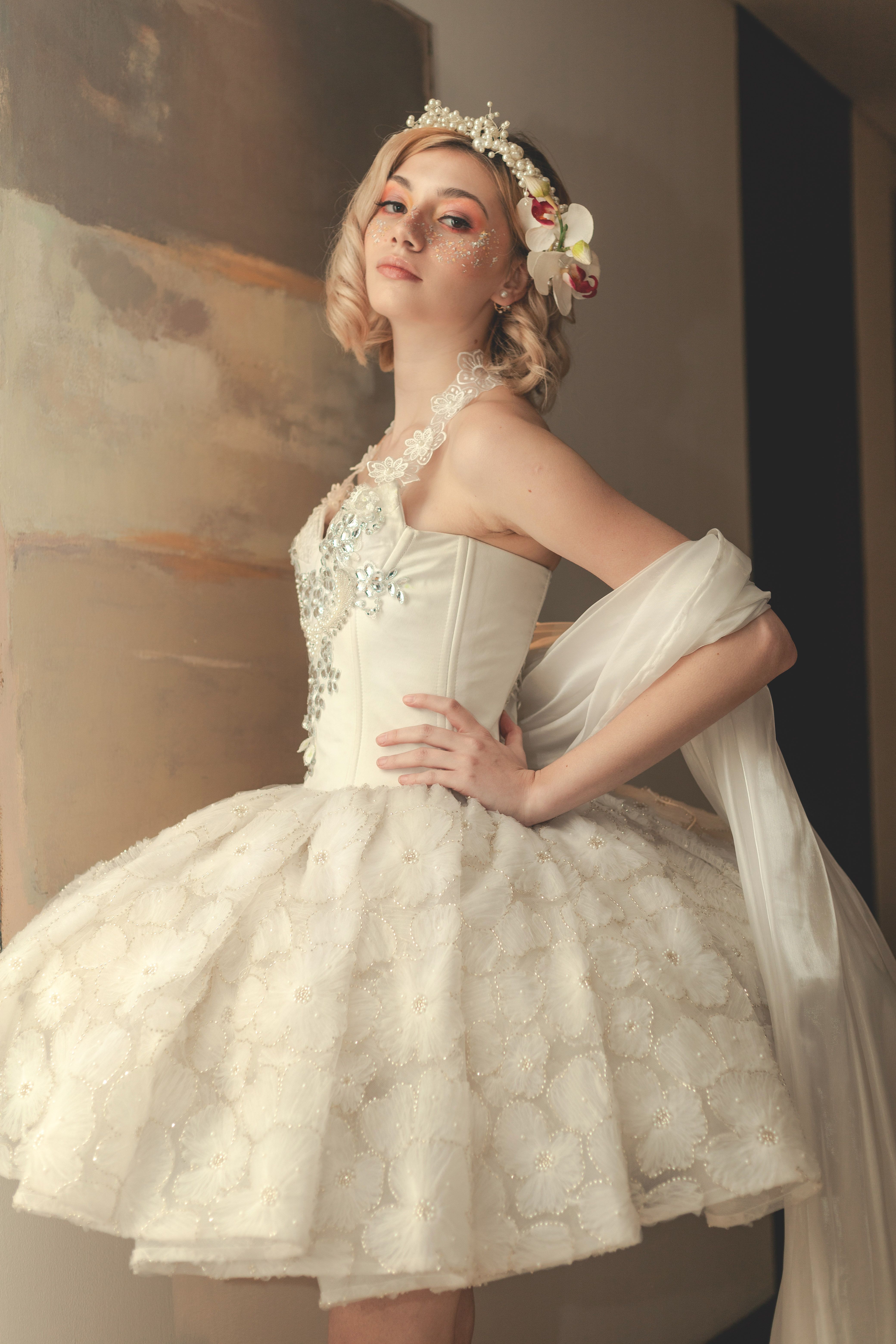 Elegant Woman in Vintage White Dress  Free Stock Photo