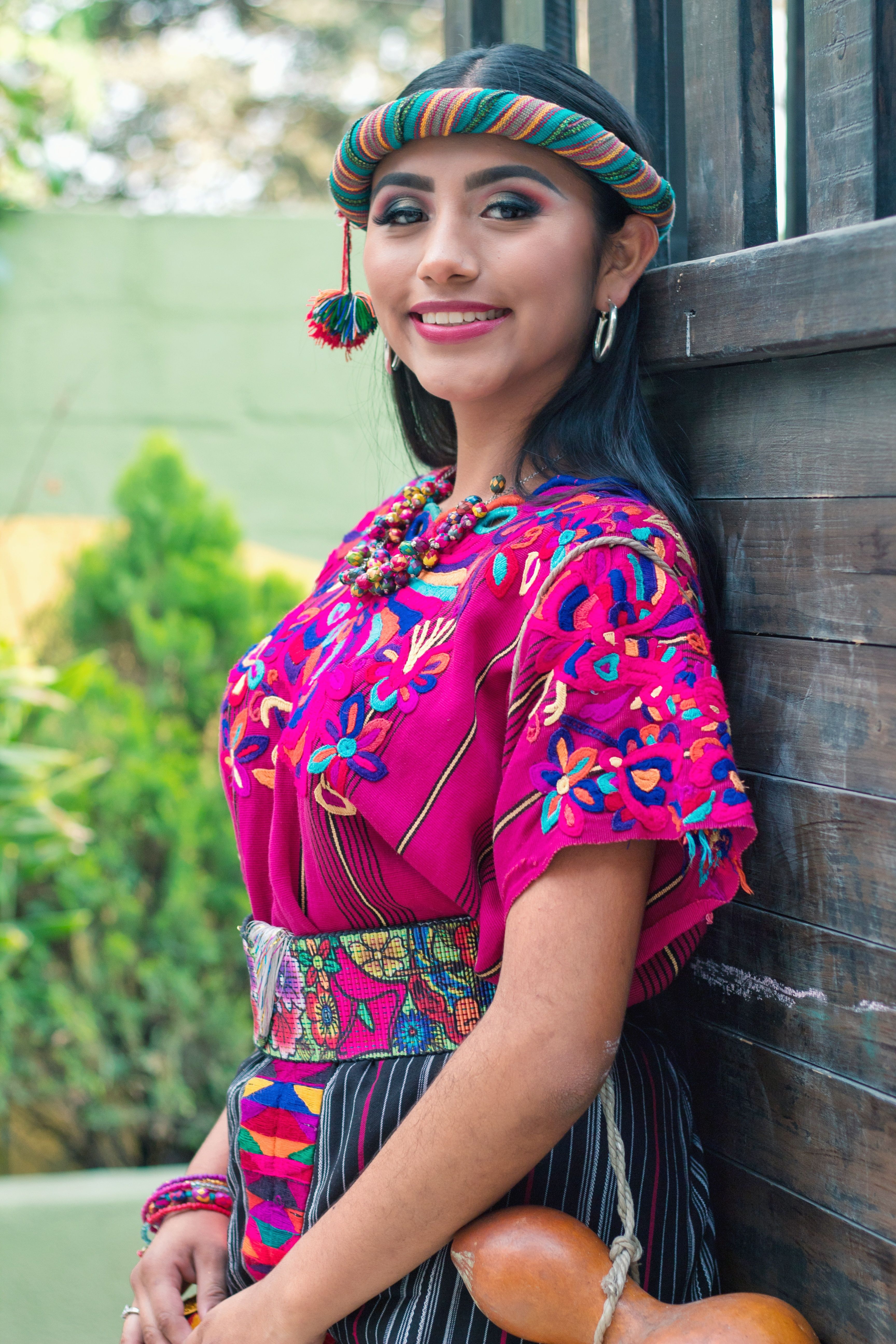 Young Woman Wearing Traditional Clothing Posing Outside  Free Stock Photo
