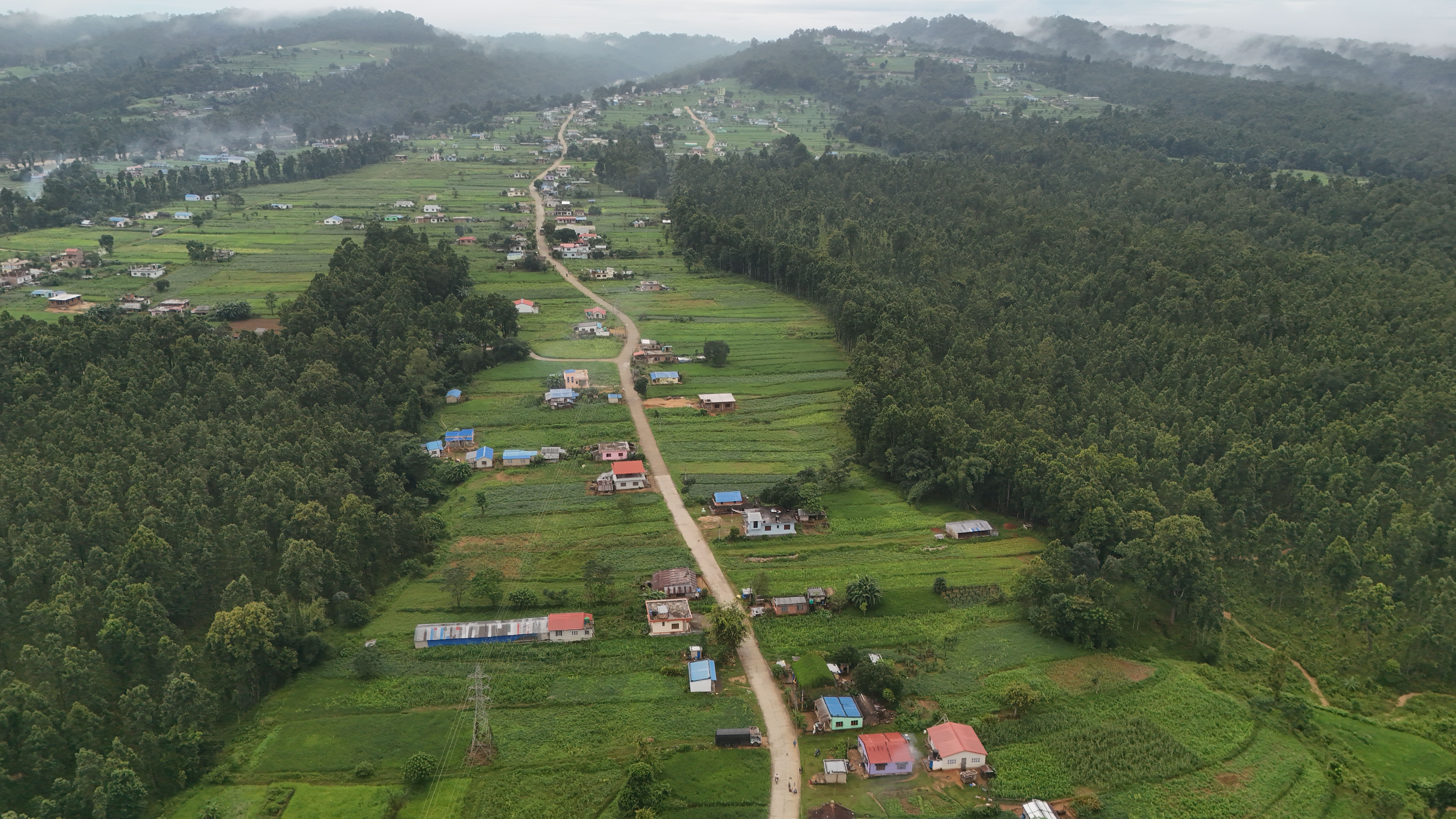 Aerial View of Lush Green Valley in Rural Nepal · Free Stock Photo