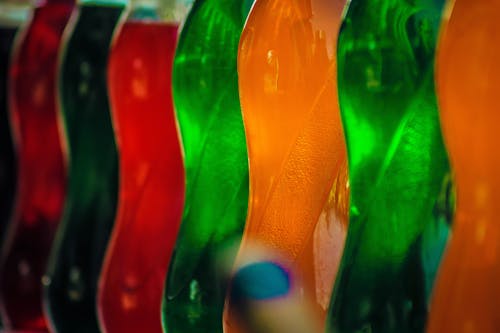 Безкоштовне стокове фото на тему «колір, пляшки, сік»