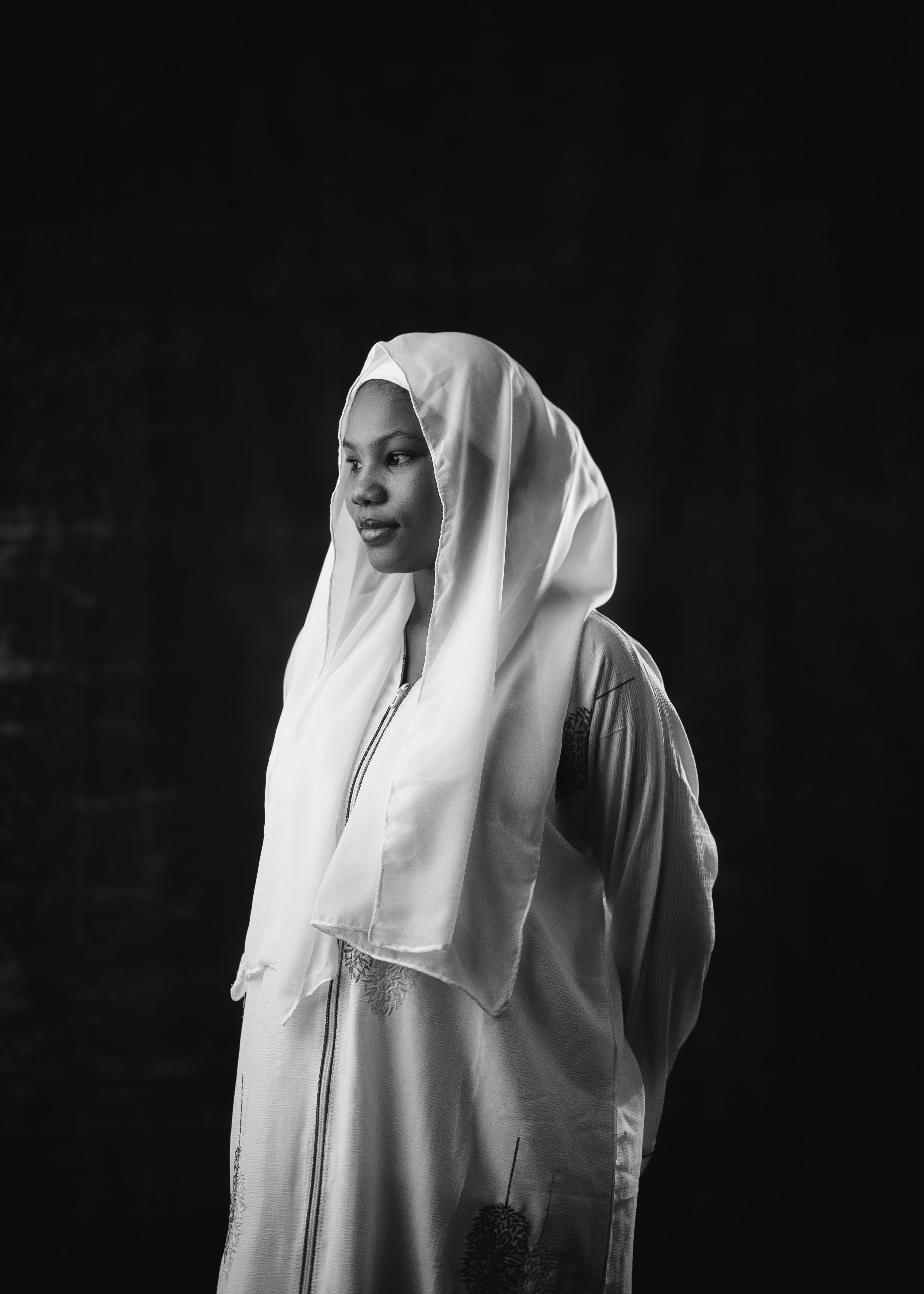 Elegant Black and White Portrait of Woman in Hijab · Free Stock Photo