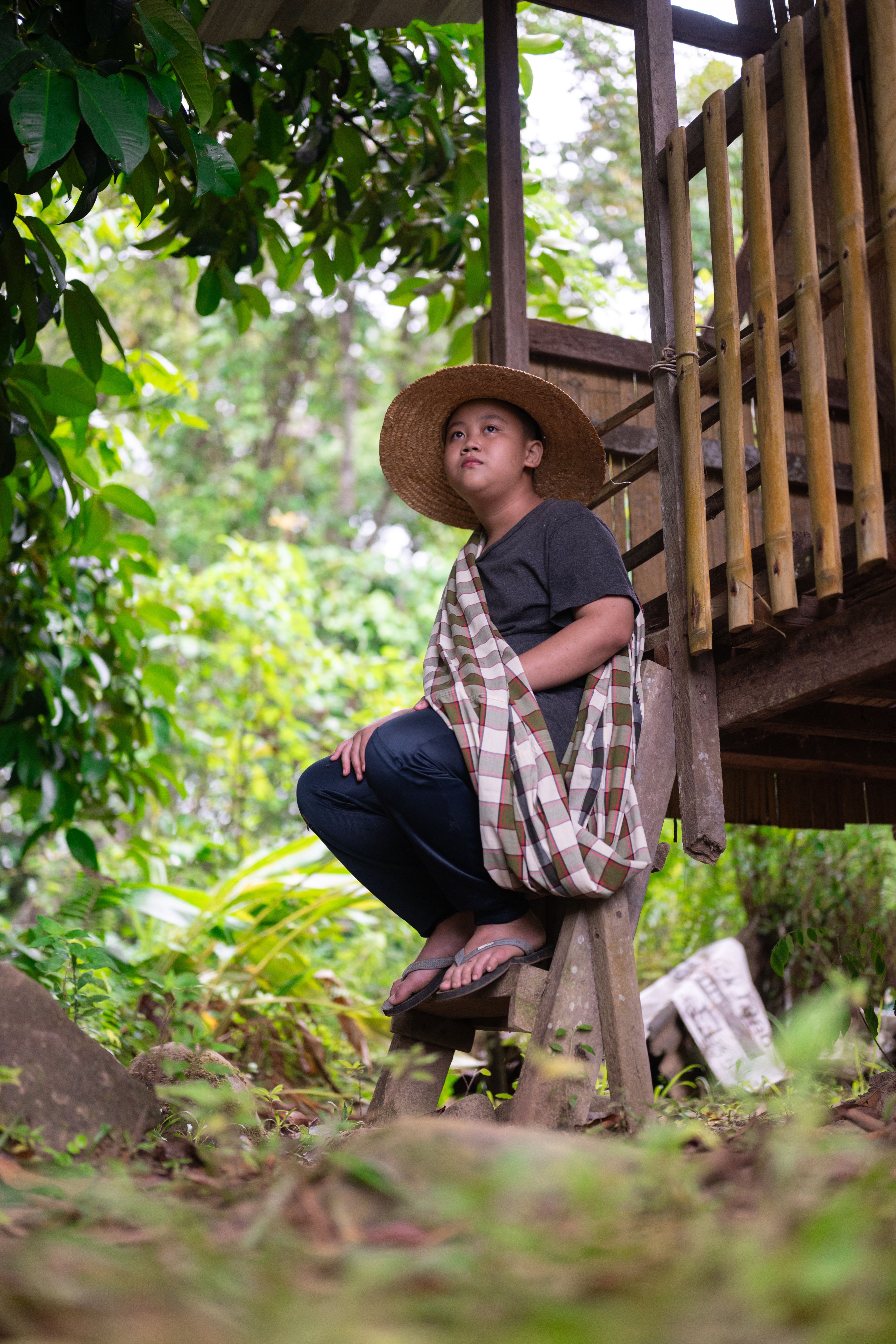 Portrait of Man Relaxing in Rural Malaysia Setting · Free Stock Photo