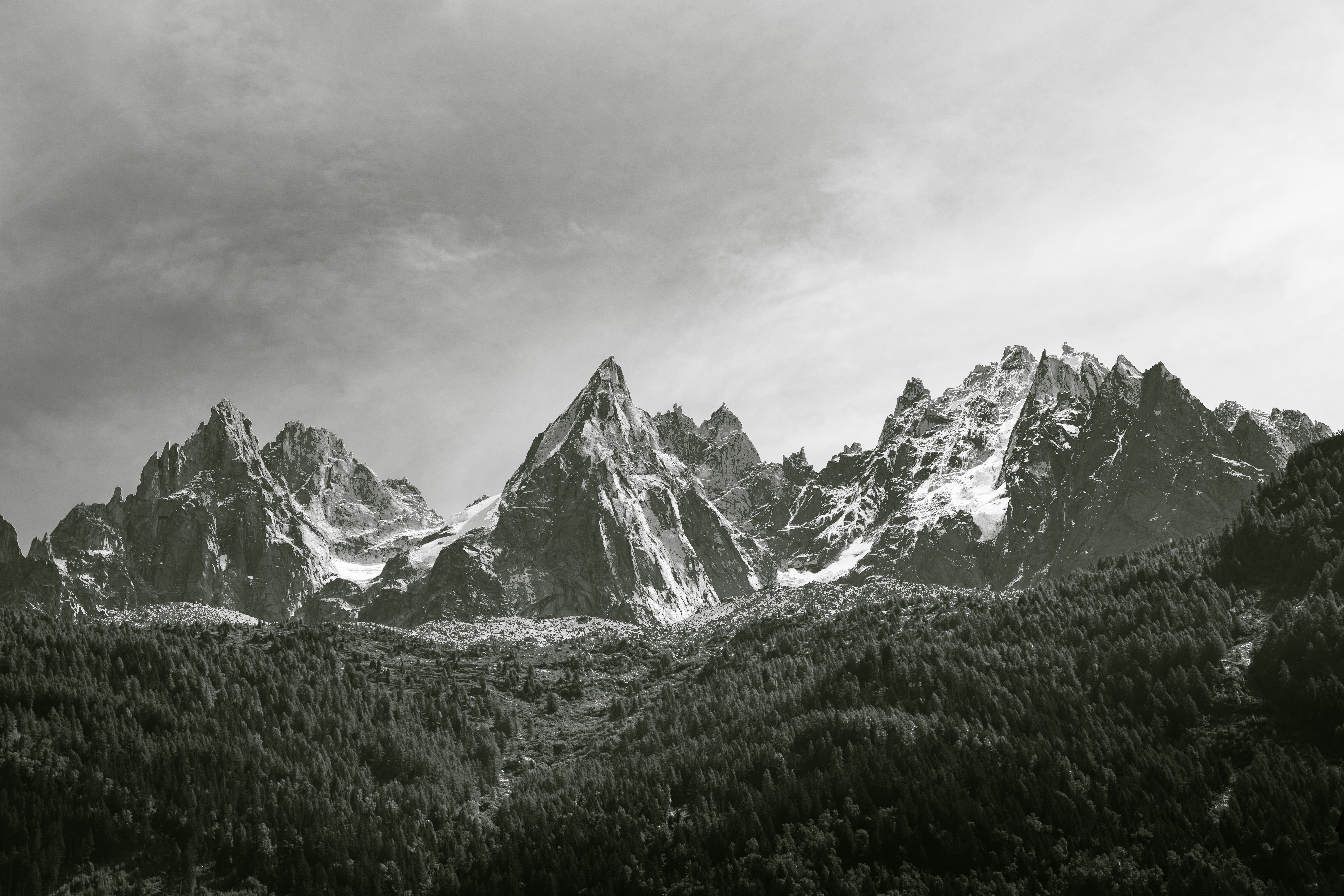Black and white photo of the dramatic peaks in Chamonix-Mont-Blanc, France.