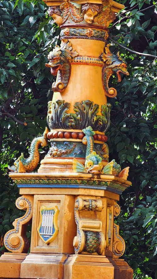 Free Intricate Zsolnay ceramic column adorned with mythical creatures, located in Pécs, Hungary. Stock Photo
