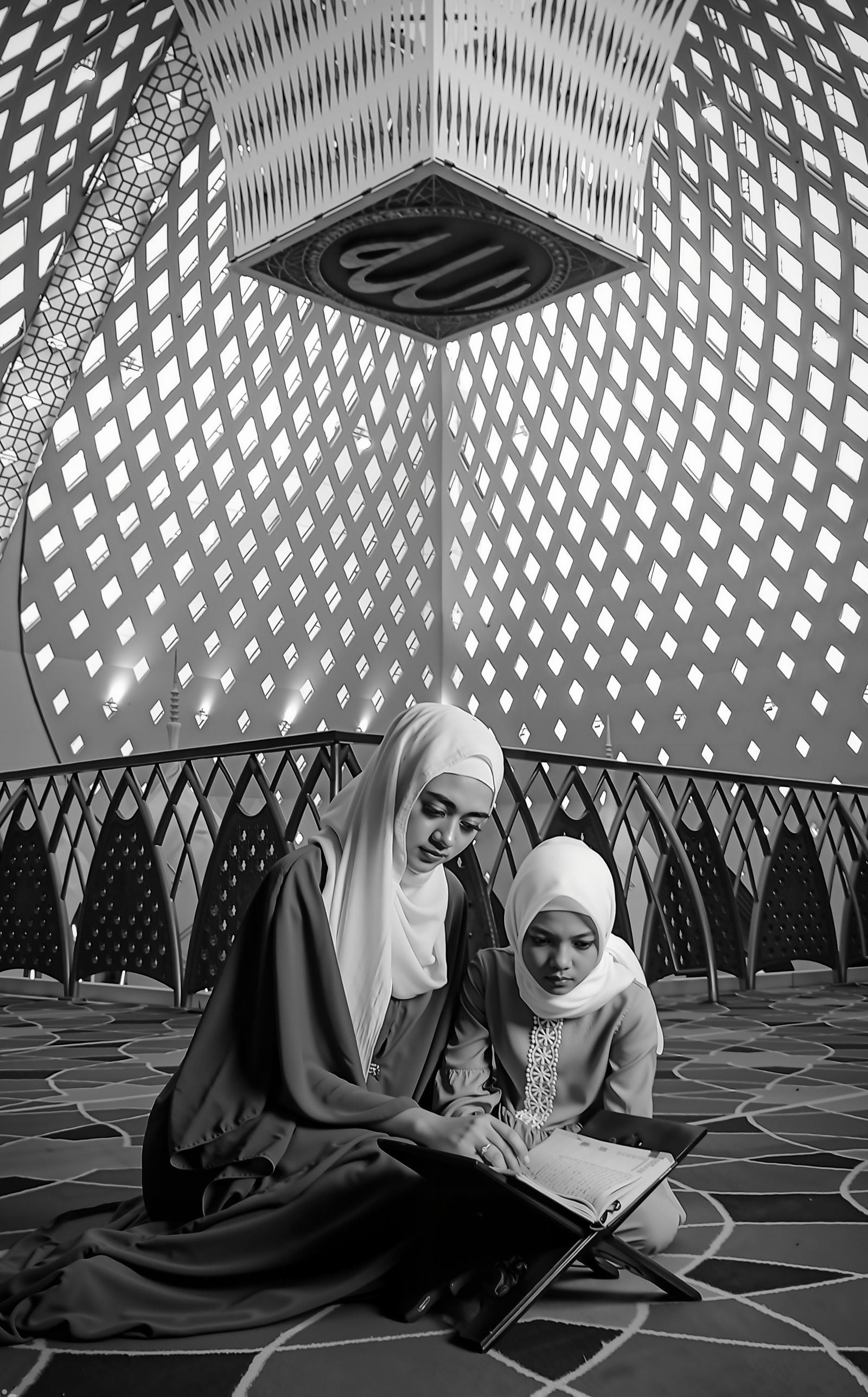 A mother and daughter reading the Quran together