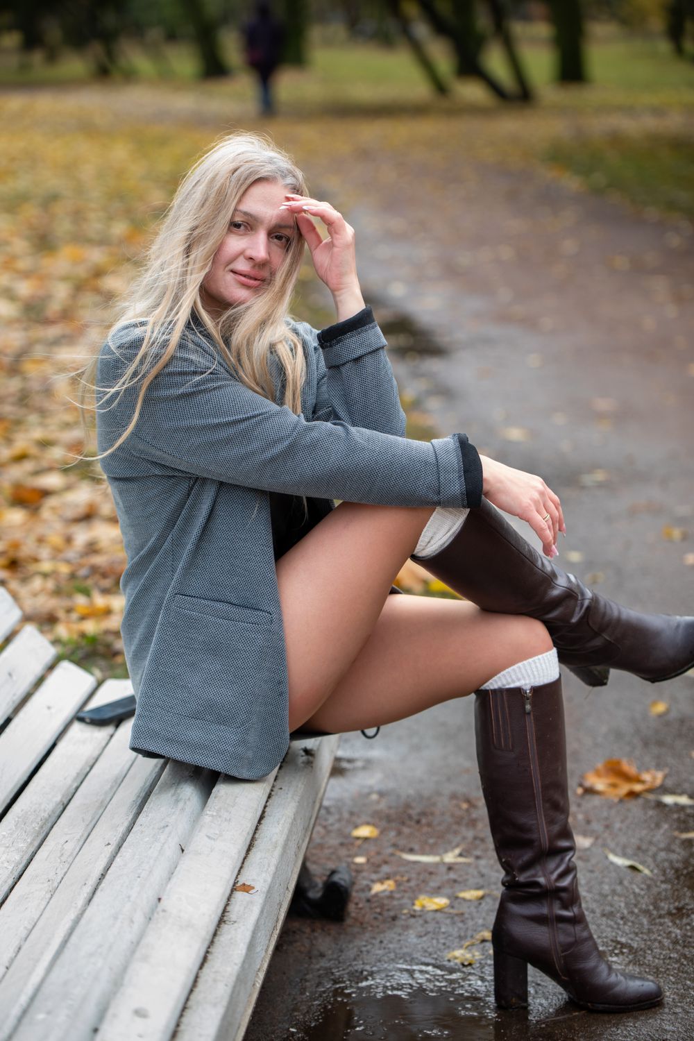 Stylish Woman Posing Outdoors in Autumn Park · Free Stock Photo