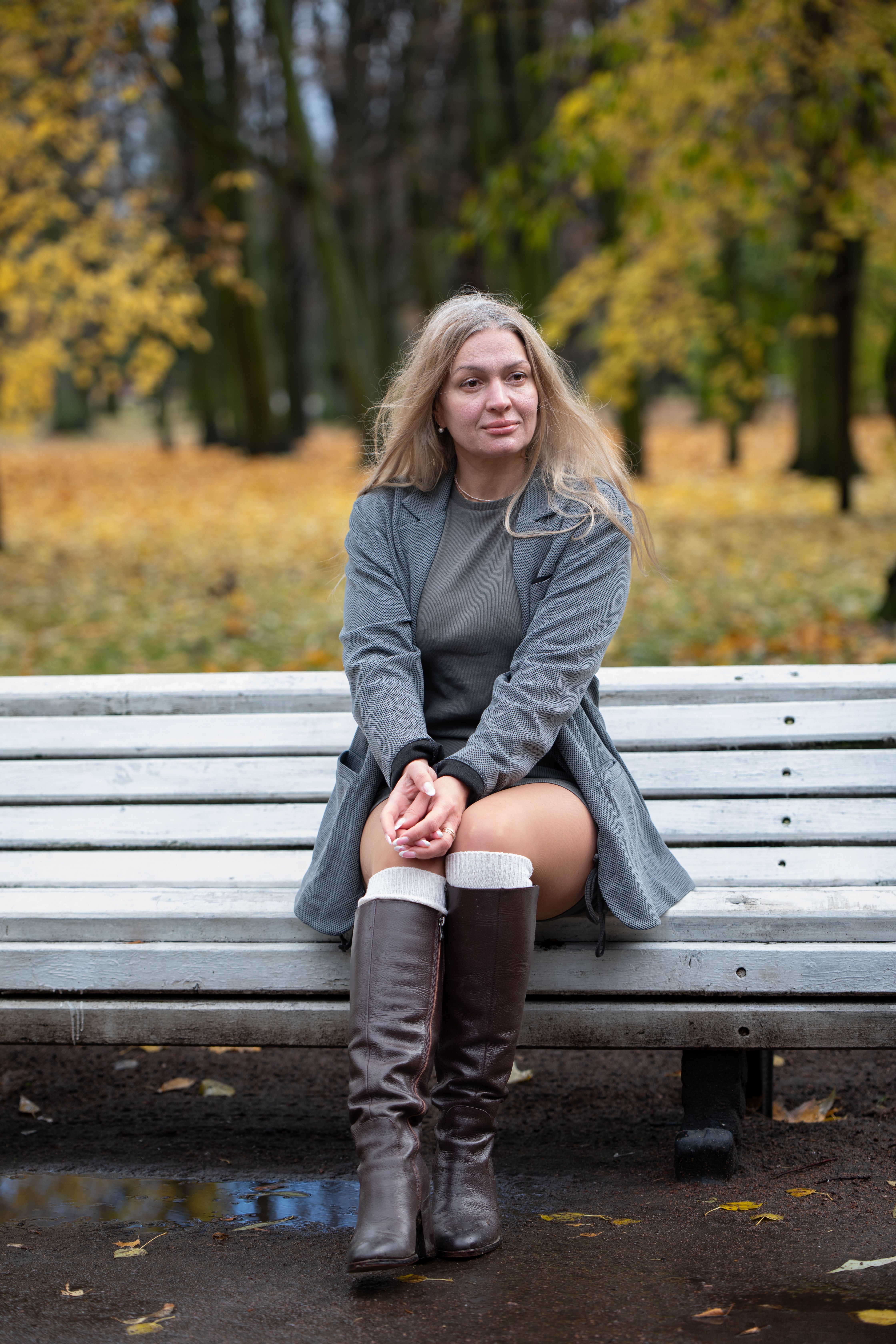 Woman Relaxing on Park Bench in Autumn · Free Stock Photo