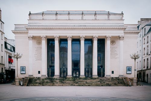 Free Front view of the historic neoclassical opera house in Nantes, showcasing grand Corinthian columns. Stock Photo