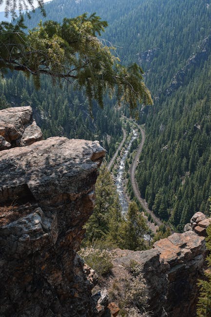Smoke rising over a canyon landscape near a closed campground