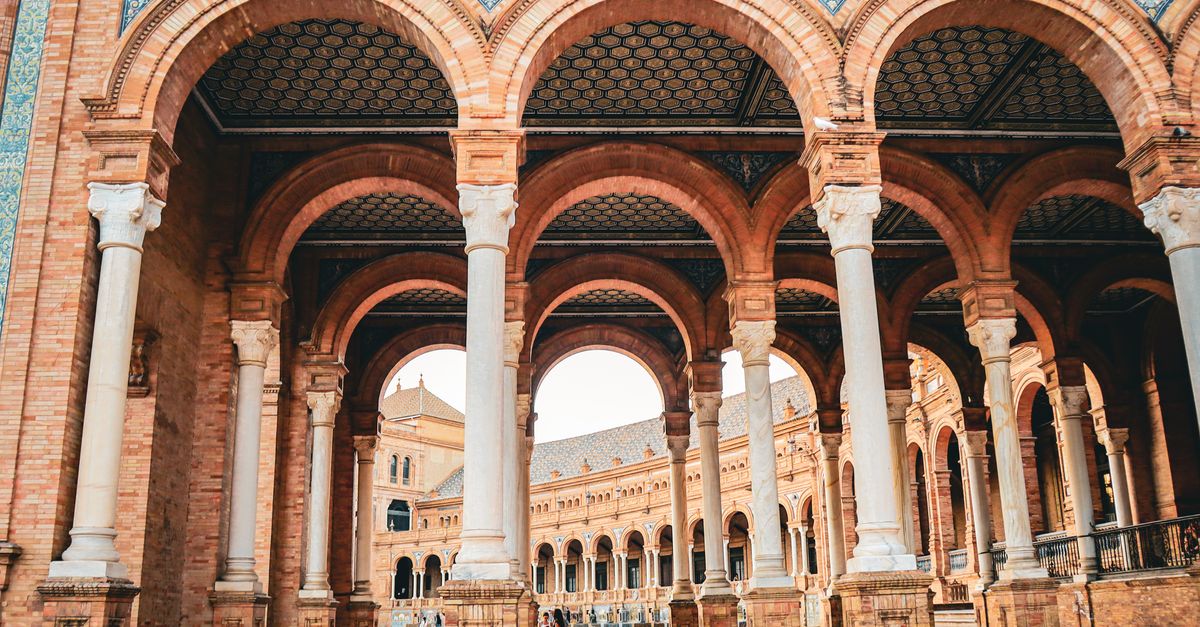 Arches and columns at Plaza de España in Seville.