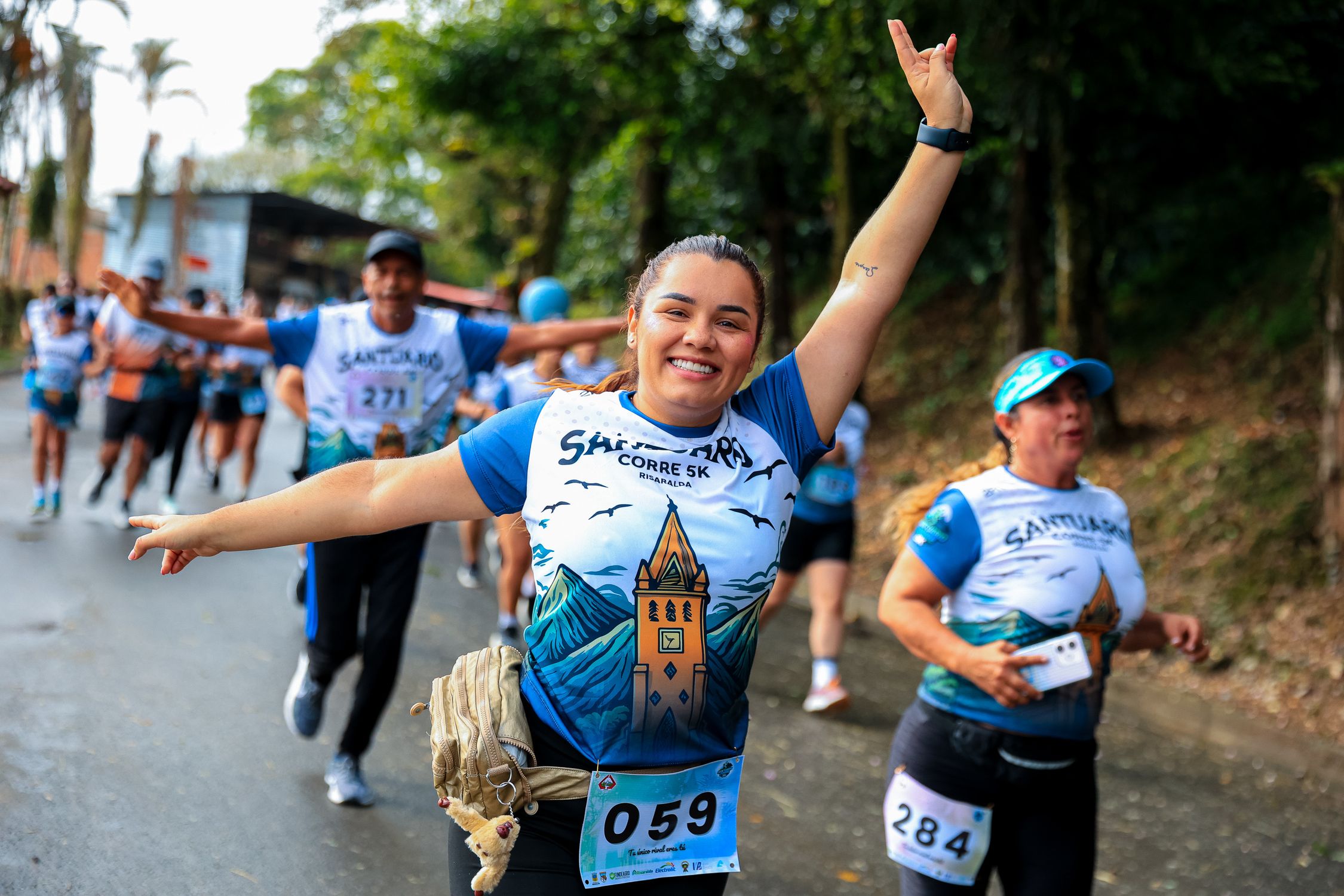 Smiling Runner Smiling Runners at Outdoor 5K Event · Free Stock Photo