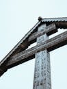 Wooden Orthodox Cross with Carvings Against Sky