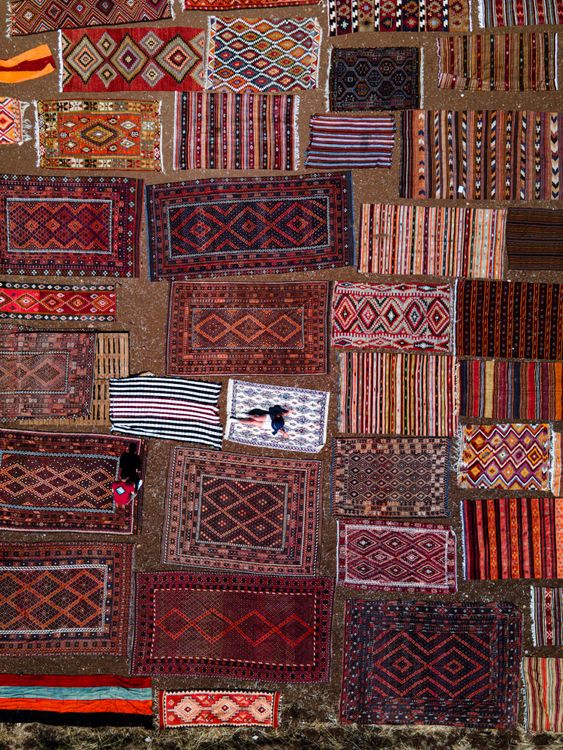 Aerial View of Colorful Traditional Rugs Displayed Outdoors · Free ...
