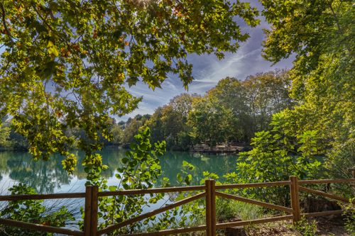 Free Tranquil lake surrounded by lush greenery in Anna, Valencia. Perfect for nature enthusiasts. Stock Photo