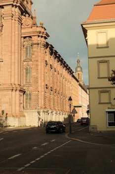 Beautiful street view of historic buildings in Würzburg, Germany, captured during sunset light.