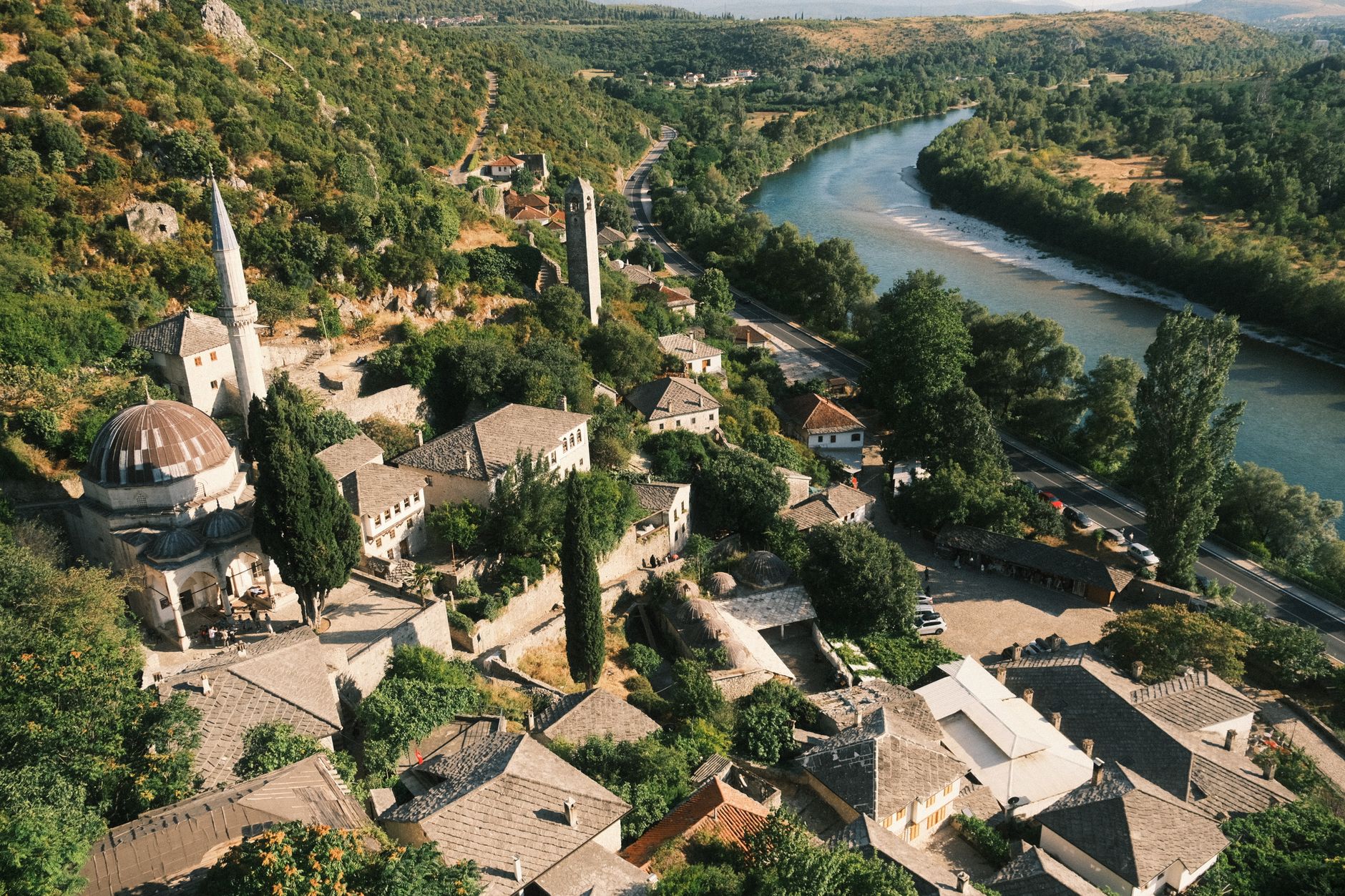 Explore the scenic beauty of Počitelj village with its Ottoman architecture and the winding Neretva River.