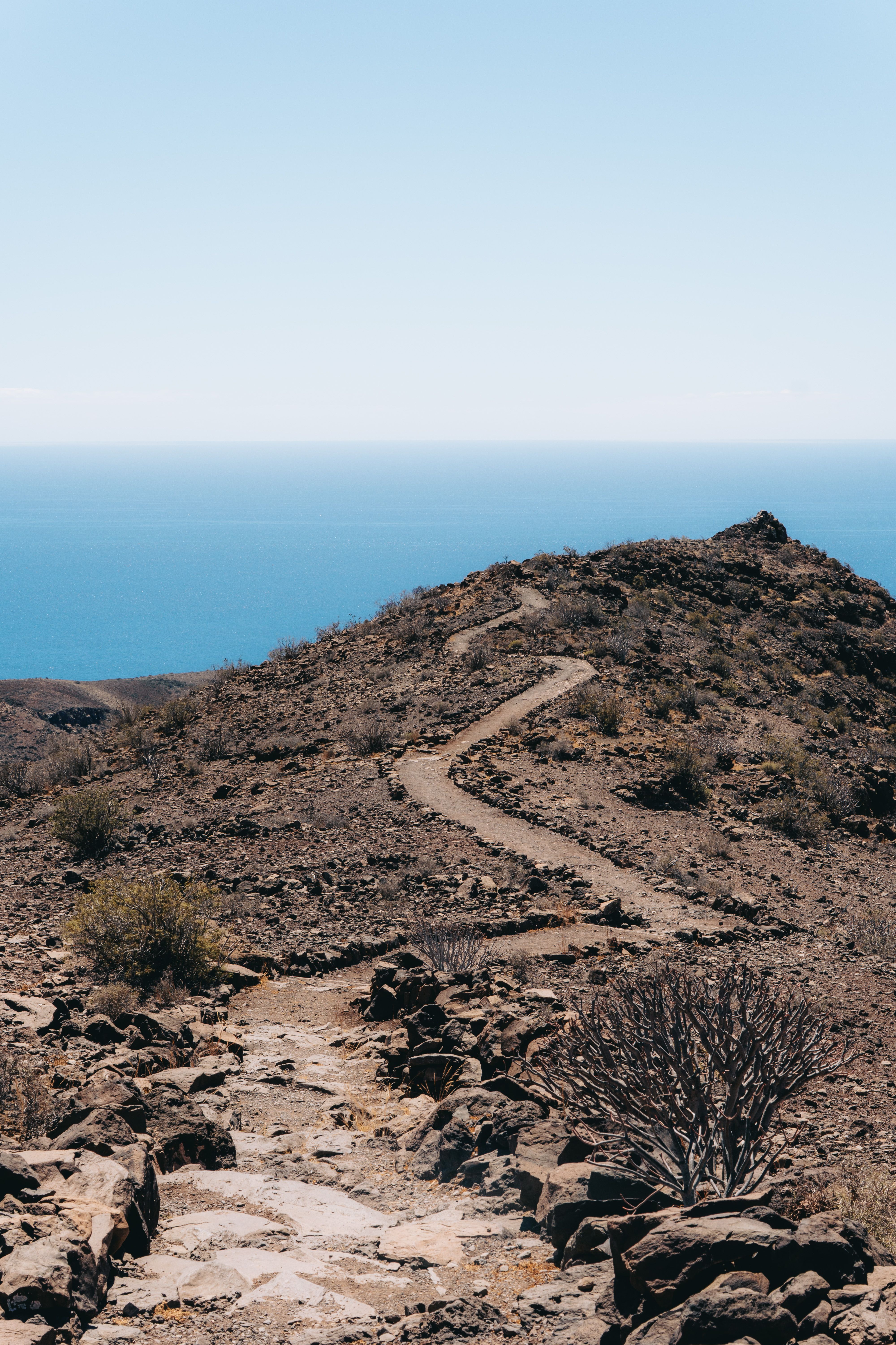 Explore a remote hiking trail with breathtaking ocean views in Alajeró, Canary Islands, Spain.