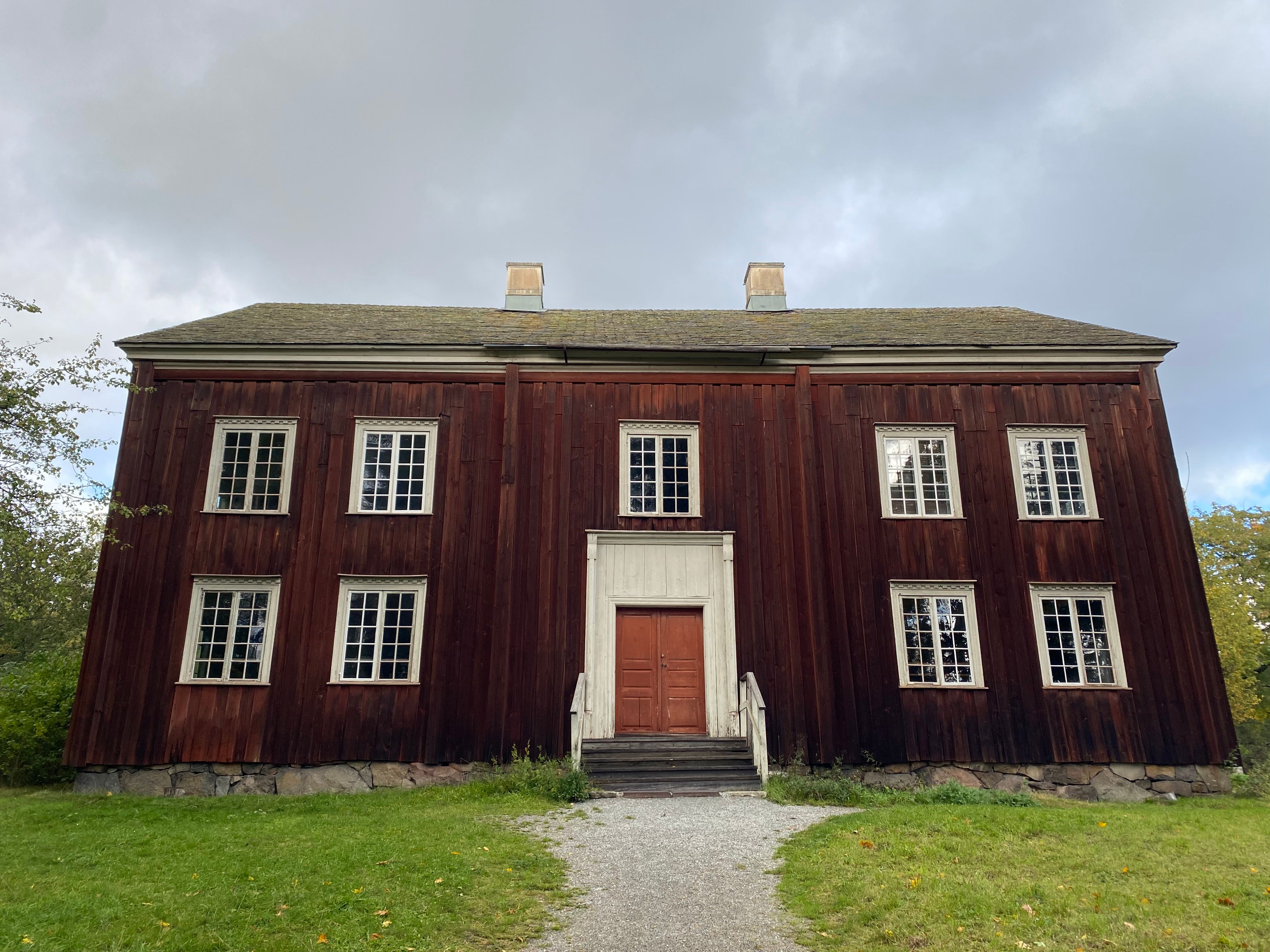 Historic Wooden House Exterior in Overcast Weather