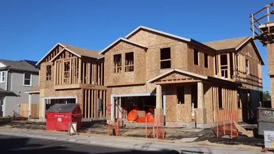 Persimmon's Profit Surge Faces Iran Conflict Threat: A Housebuilding Dilemma