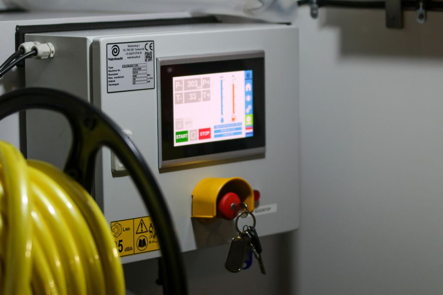 Industrial control panel with digital display and switches