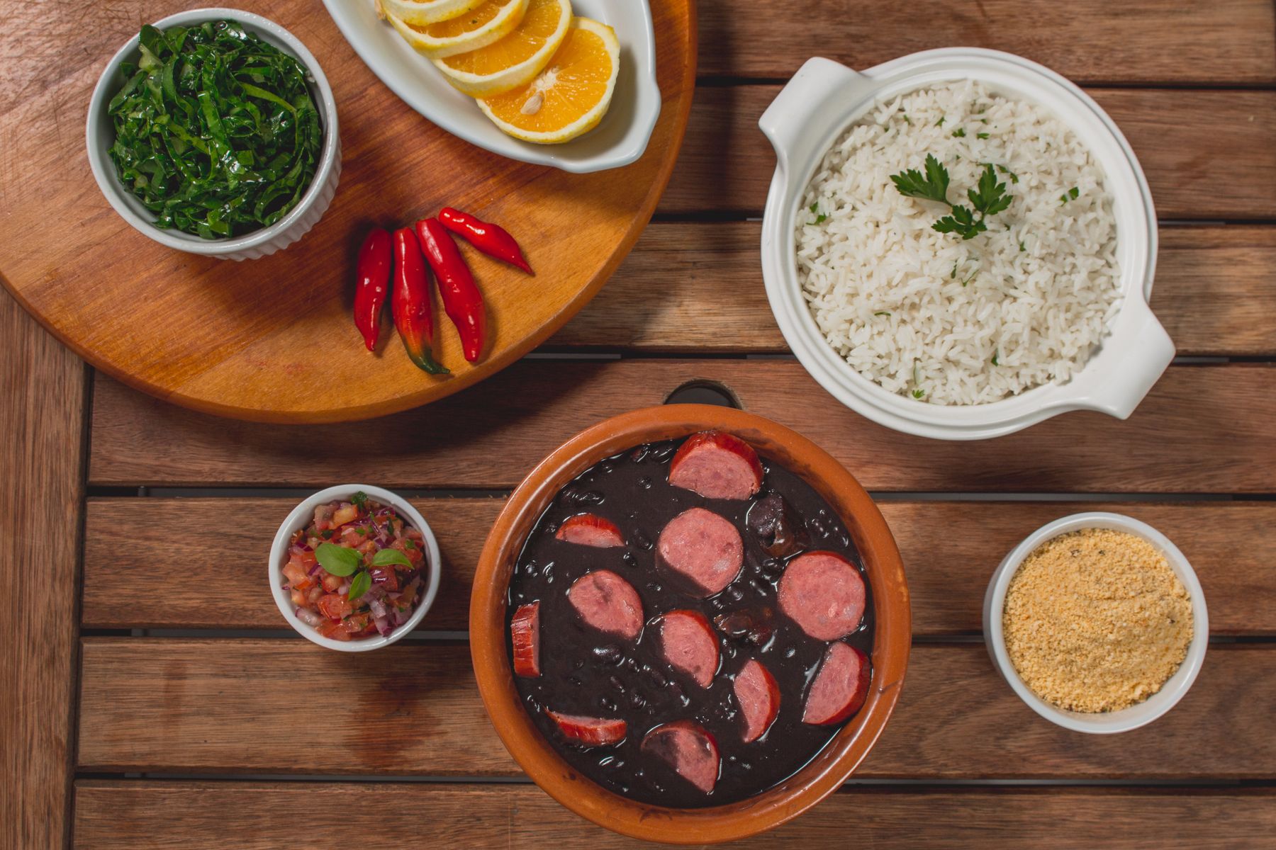 Traditional Brazilian feijoada with rice and sides