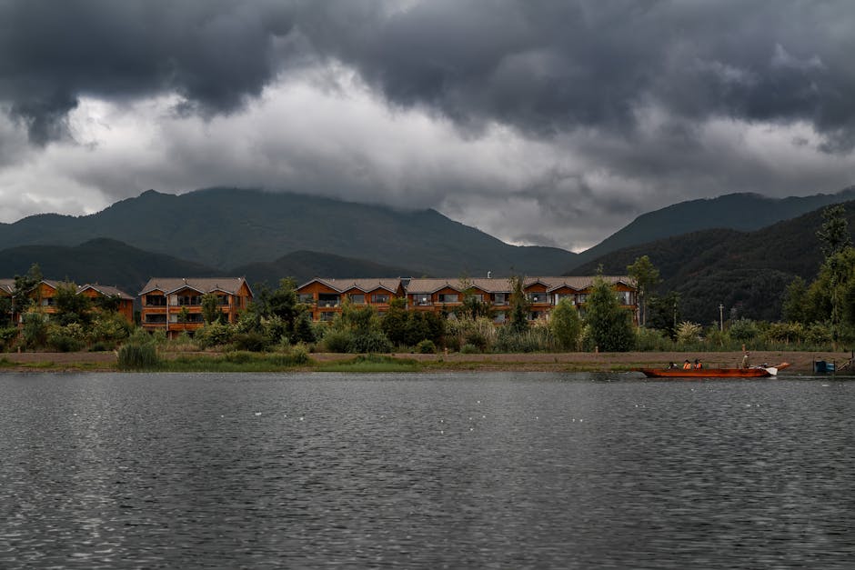 dramatic storm clouds gathering over a residential street in Birmingham - residential roofers birmingham al dramatic storm clouds gathering over a residential street in Birmingham - residential roofers birmingham al