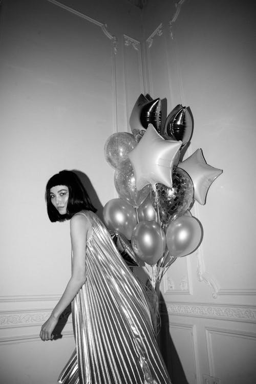 Woman Posing Near Balloons