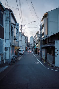 Explore the quiet streets of the Gion District in Kyoto, Japan, during the peaceful dusk hours.
