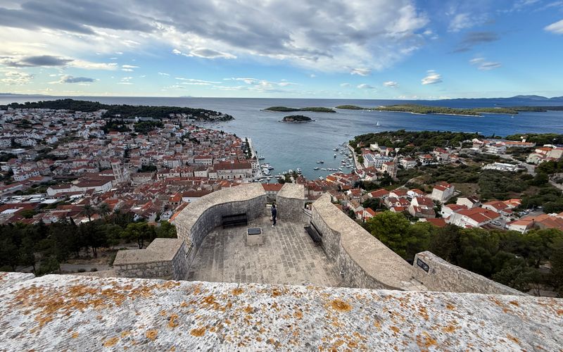 Hvar town Croatia harbour fortress walls Adriatic sea island aerial view