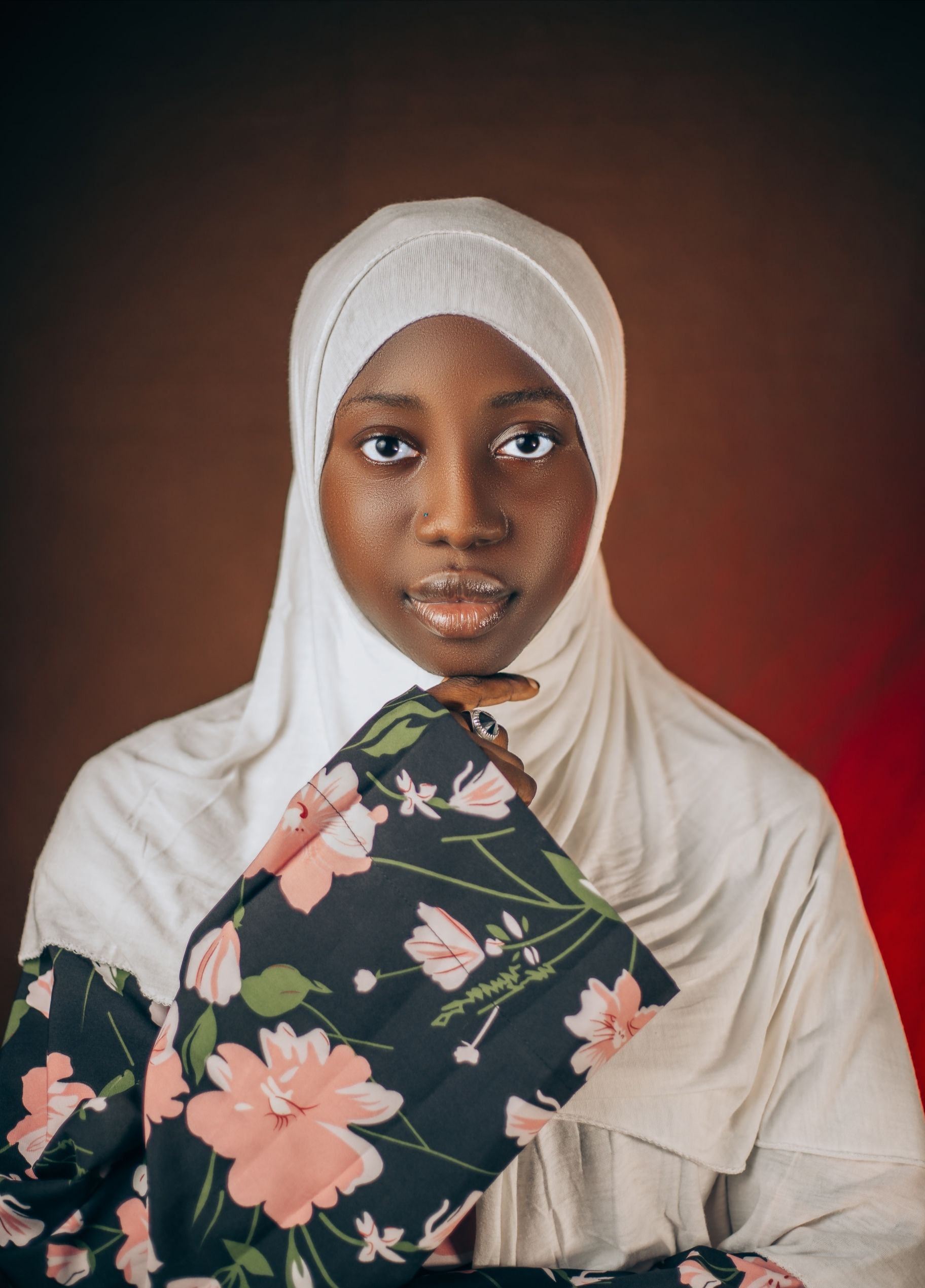 Woman with Hijab Posing Against Brown Background · Free Stock Photo