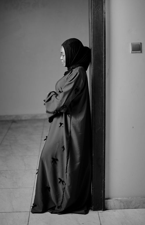 Free Black and white portrait of a woman in traditional attire indoors Stock Photo