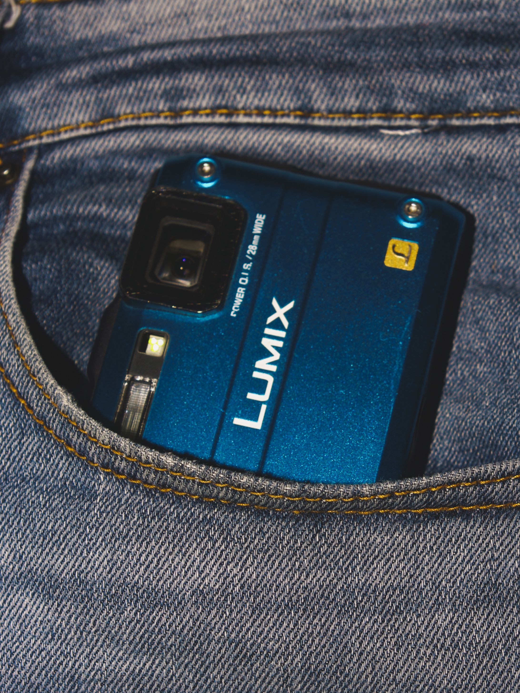 Blue Compact Camera in Denim Pocket Close-up · Free Stock Photo