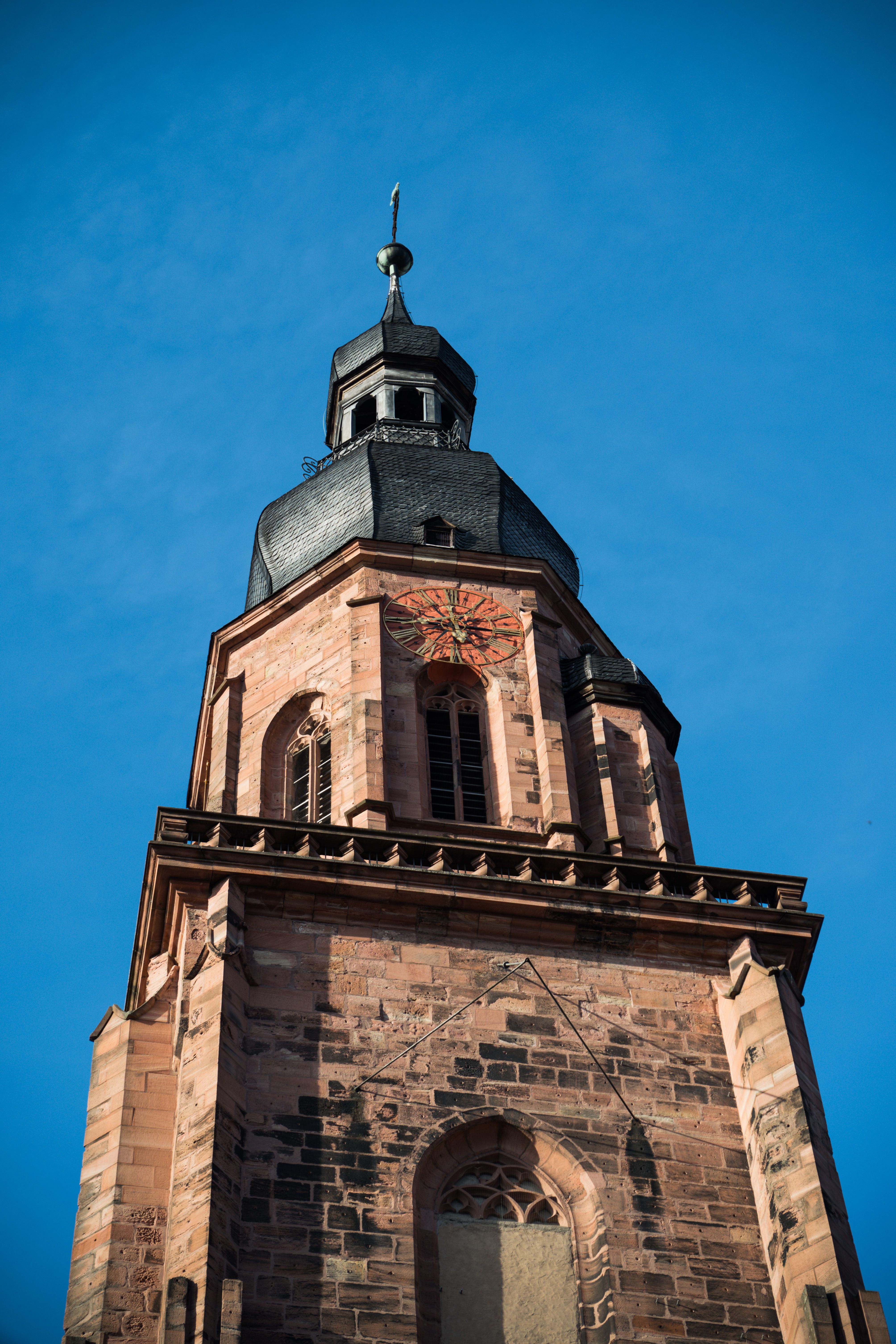 Historic Church Tower Against Blue Sky · Free Stock Photo