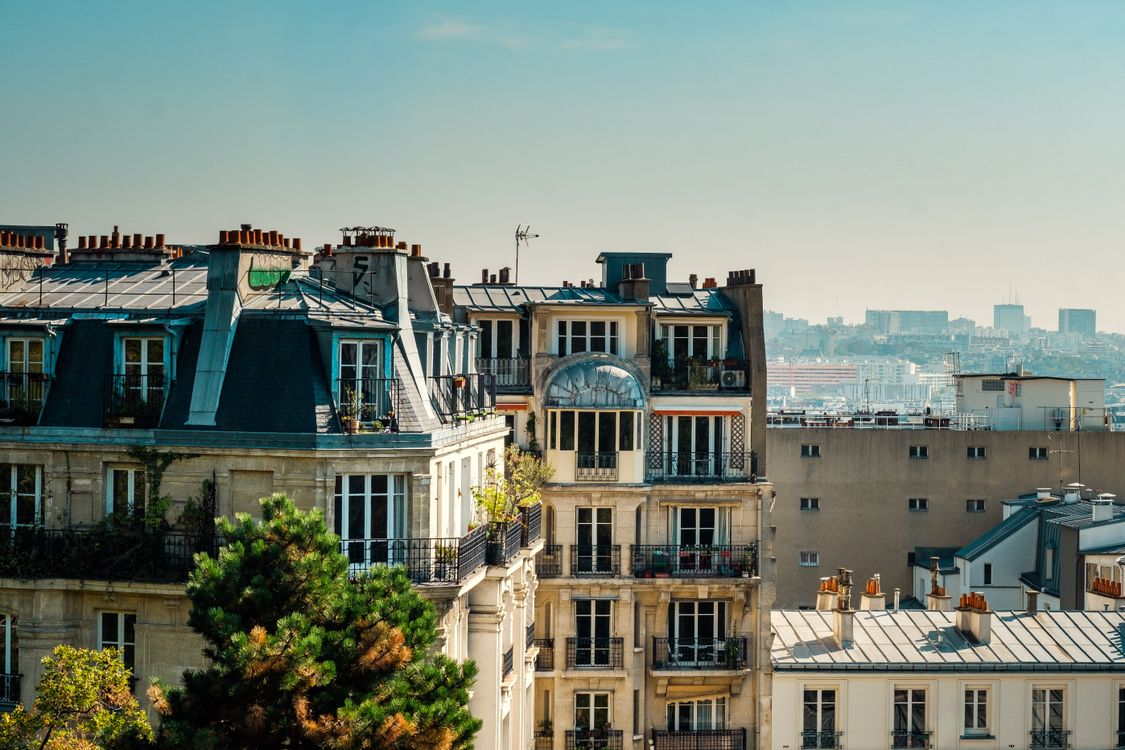 Charming Paris Rooftops on a Sunny Day · Free Stock Photo
