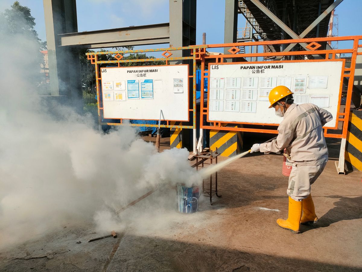 Industrial fire safety training with extinguishers