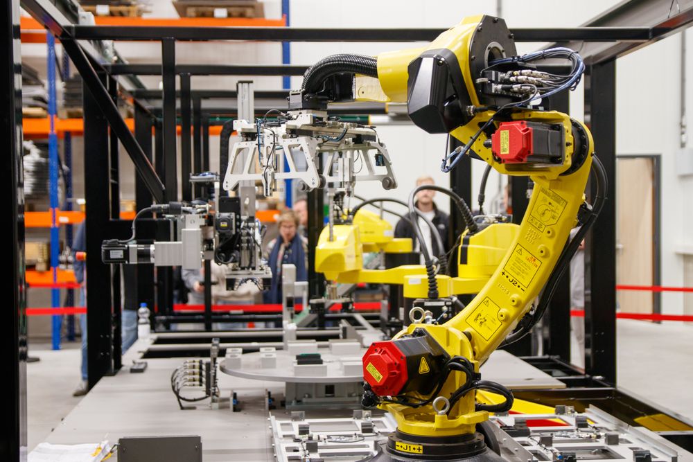 AI manufacturing robot arm factory automation defect detection