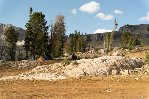 Free Peaceful campsite with tents nestled in the wilderness of Grand Teton National Park, Wyoming. Stock Photo