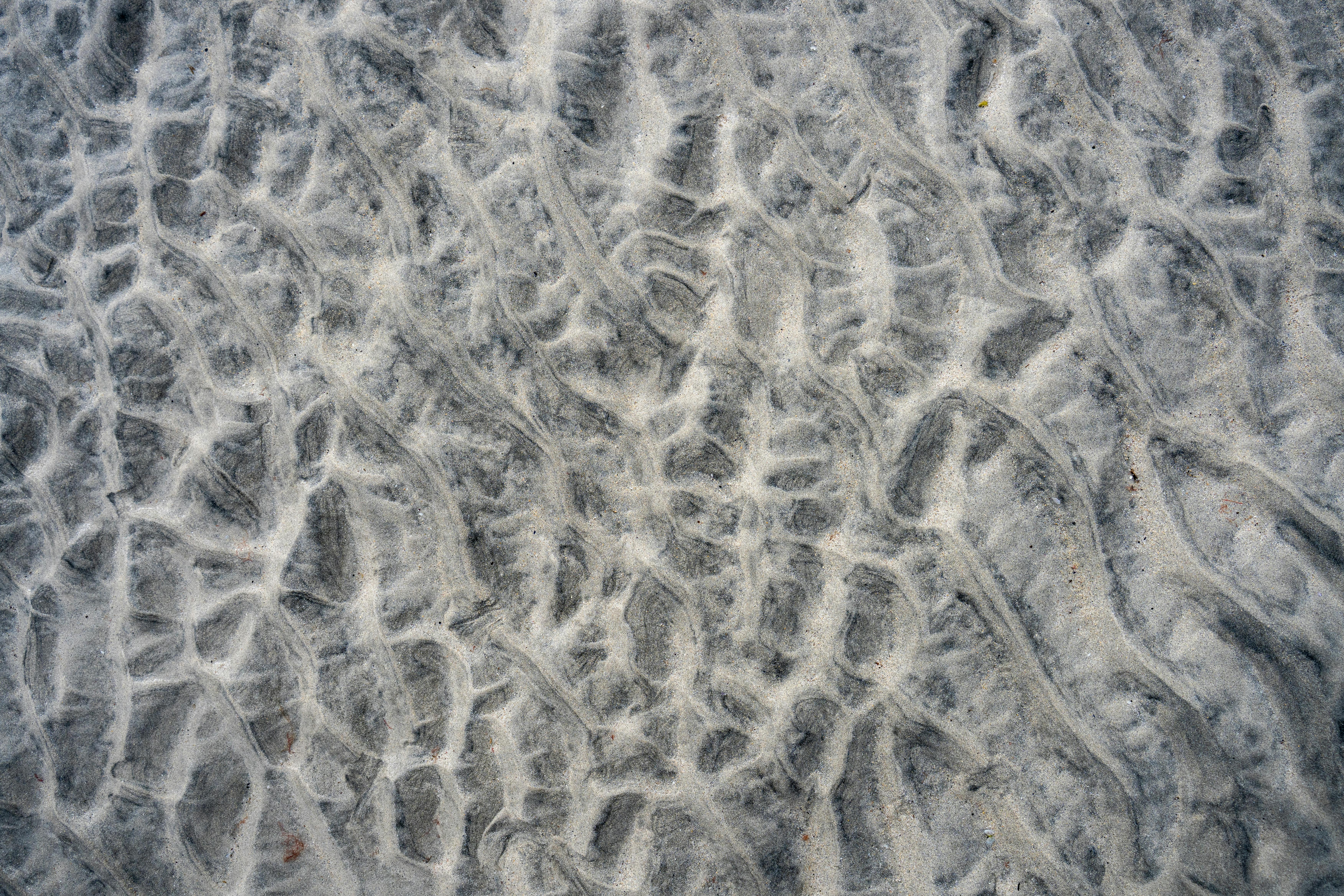 gratis Abstract bovenaanzicht van gestructureerde zandpatronen op Luskentyre Beach, Harris, Schotland. Stockfoto