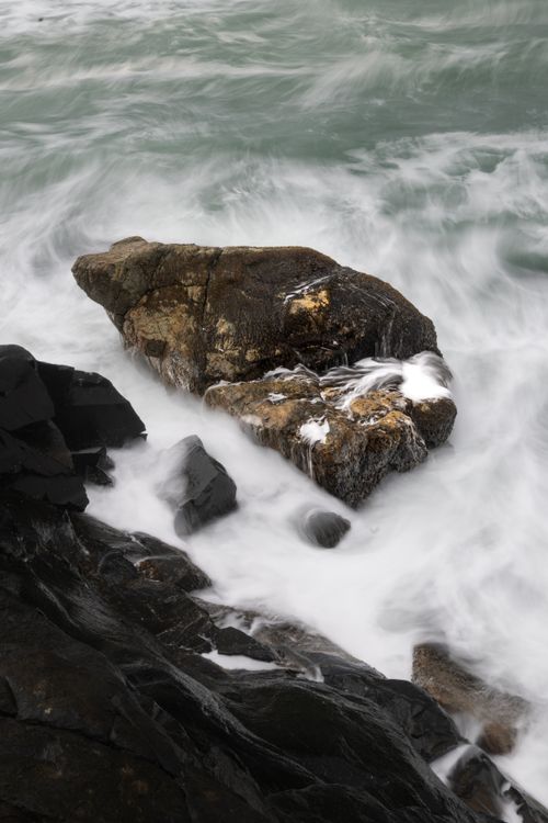 Free Stunning view of a rock formation with waves crashing on the Brazilian coast, perfect for nature and travel enthusiasts. Stock Photo