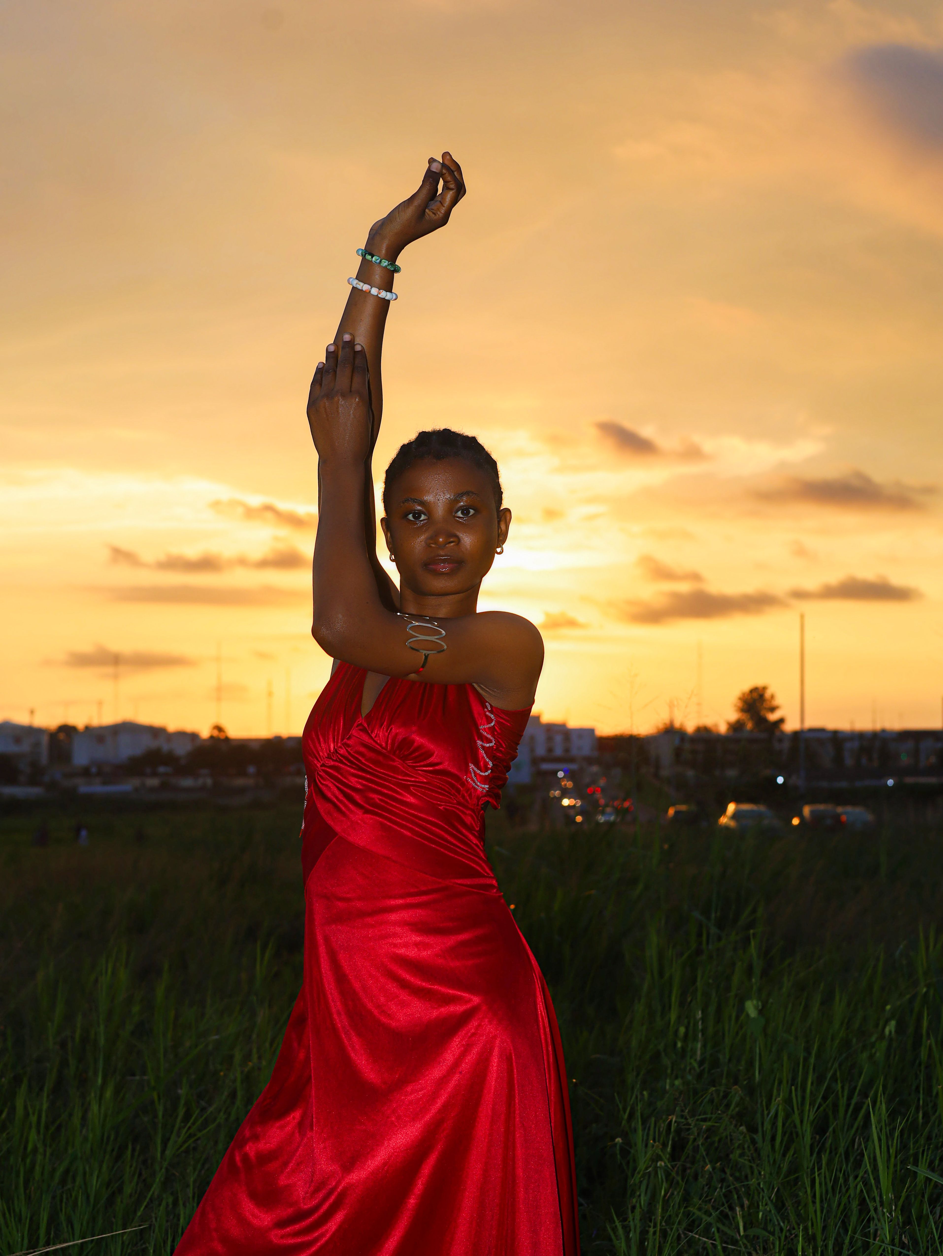 Elegant Woman in Red Dress at Sunset · Free Stock Photo