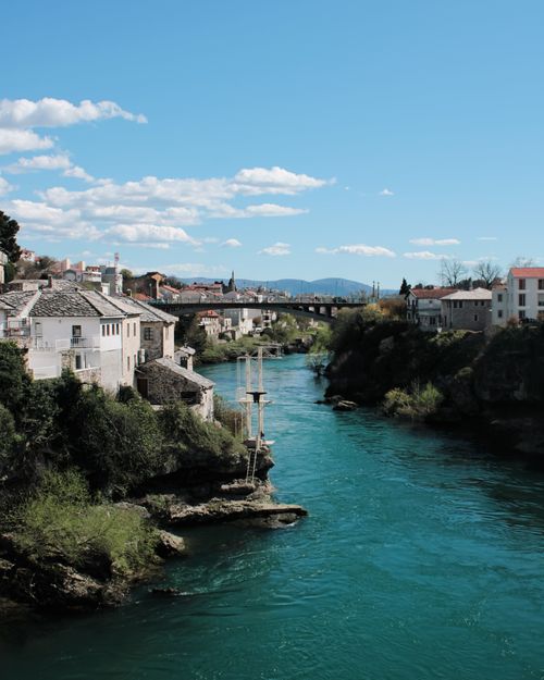 Free Discover the charming architecture and vibrant Neretva River in Mostar, Bosnia and Herzegovina. Stock Photo