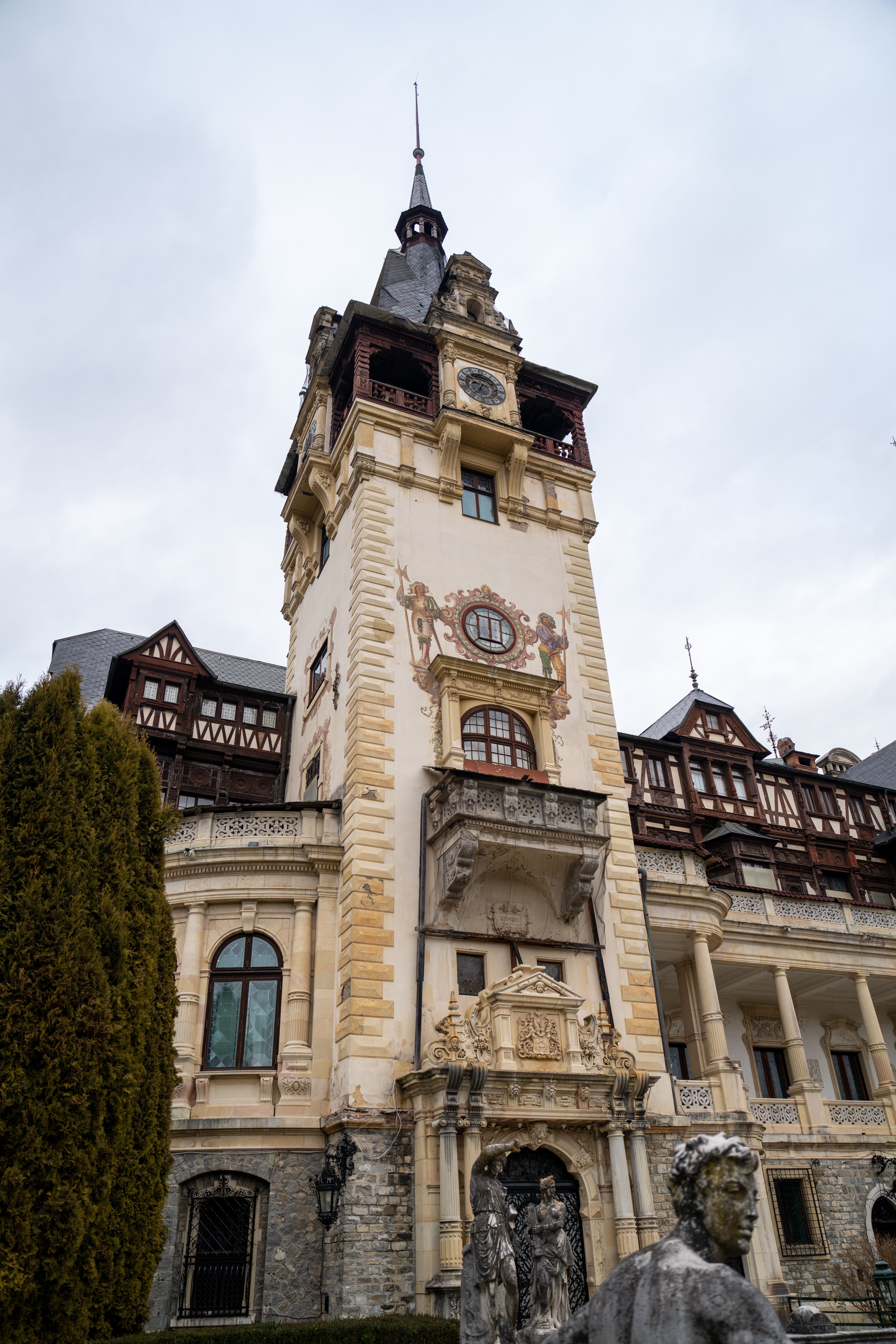 Historic European Castle Tower Under Cloudy Sky · Free Stock Photo