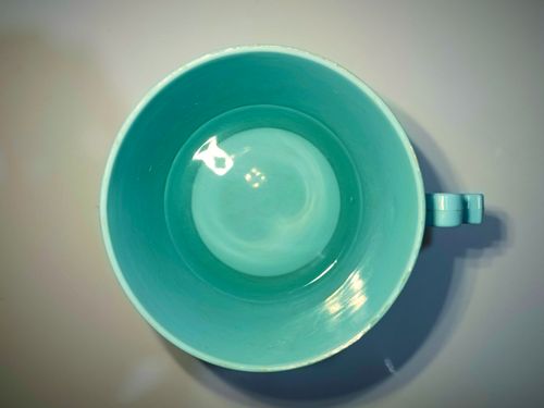 Free Miracle Heart Shadow Appear in a Turquoise Plastic Cup Filled with Water Stock Photo