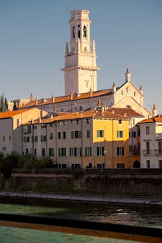 Sunlit view of San Giorgio in Braida church with classic Italian architecture in Verona.