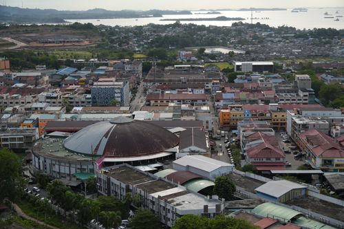 Free Aerial View of a City with a Domed Building Stock Photo