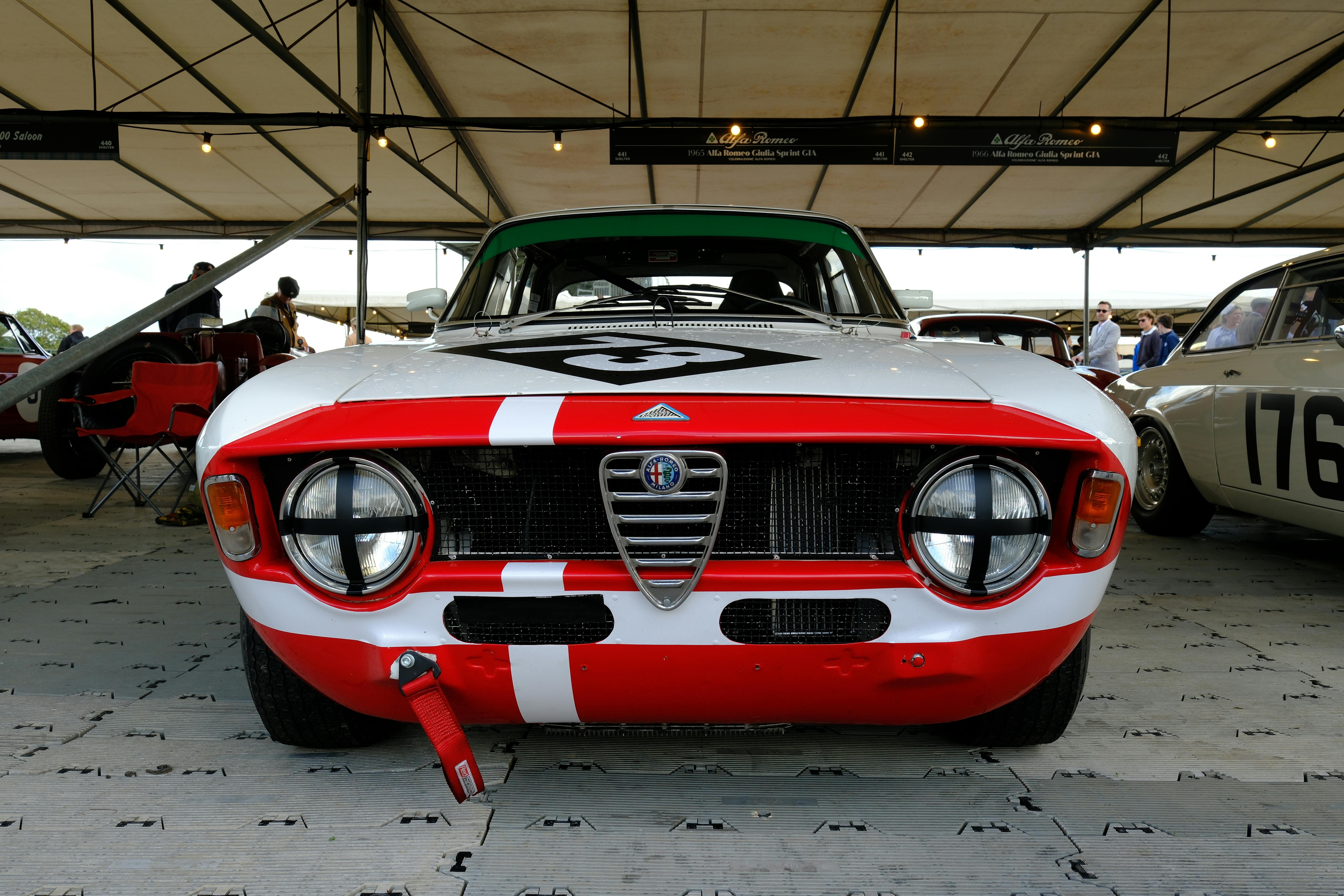 Front view of a classic Alfa Romeo racing car at Goodwood, England.